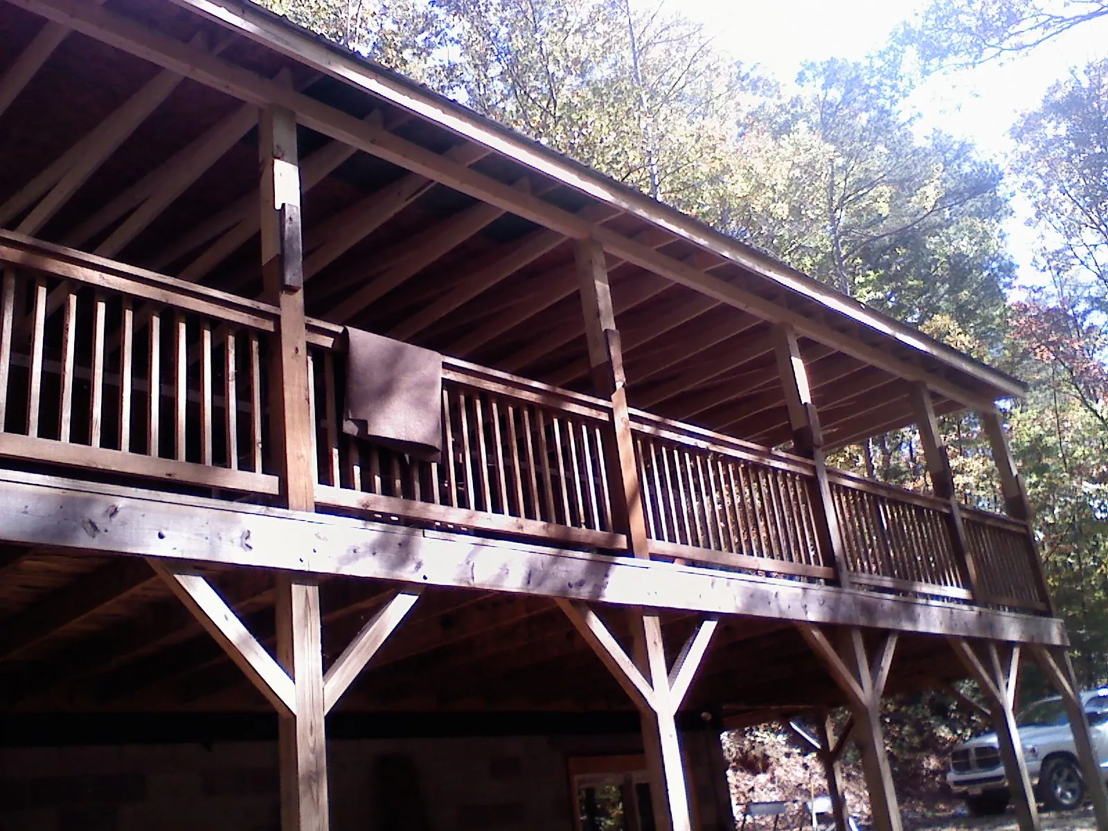 Timber framing under a new elevated porch and deck — Roof Leak Repair in Millstone Township by Roofing Brothers